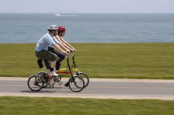 Riding bikes along the lake south of the city