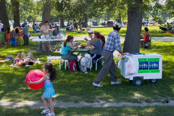 People enjoy a summer day at Montrose Beach