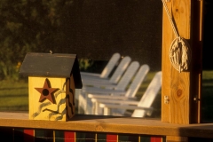 Union Pier, Michigan, bird house and lawn chairs at sunset at Bed & Breakfast